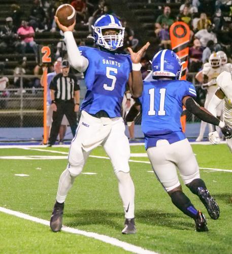 West Feliciana quarterback Joel Rogers (5) passes to his receiver during their game against Livonia on Friday night.
