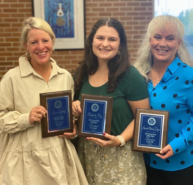 The West Feliciana Parish School Board honored the district's three Teaches of the Year for 2021 at an Oct. 19 meeting. From far left are Laura Lindsey of Bains Lower Elementary School; Kim Key of West Feliciana High School; and Sarah Claire Dyer of West Feliciana Middle School.