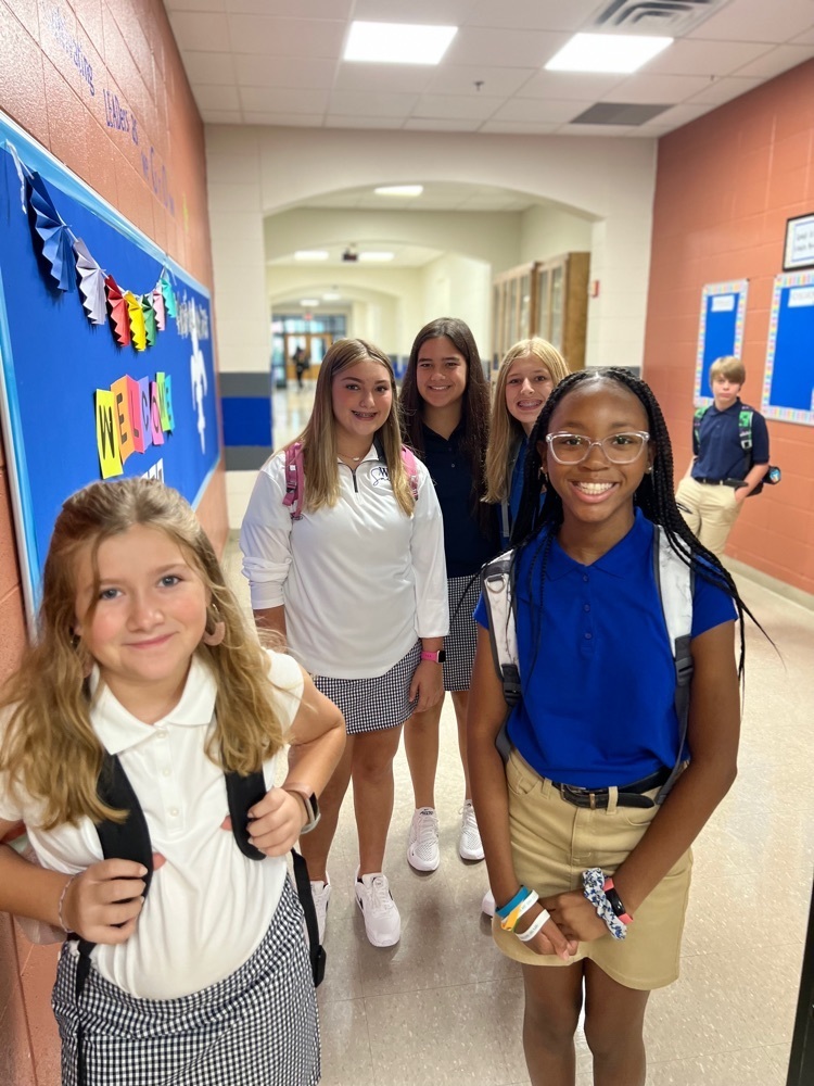 Students cruise the 6th grade hallway  