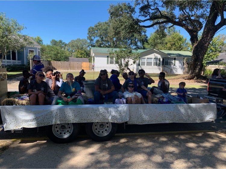middle school students on a float
