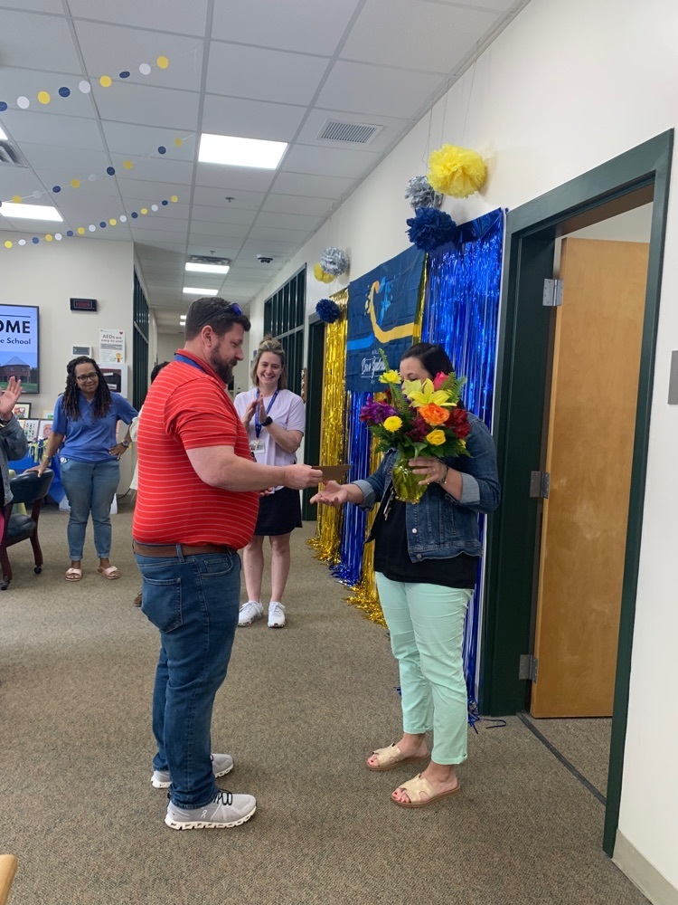 Mr. Lester surprised Ms. Arceneaux with flowers  